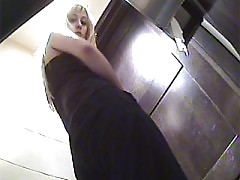 Young babes pissing in a spycammed warehouse toilet
